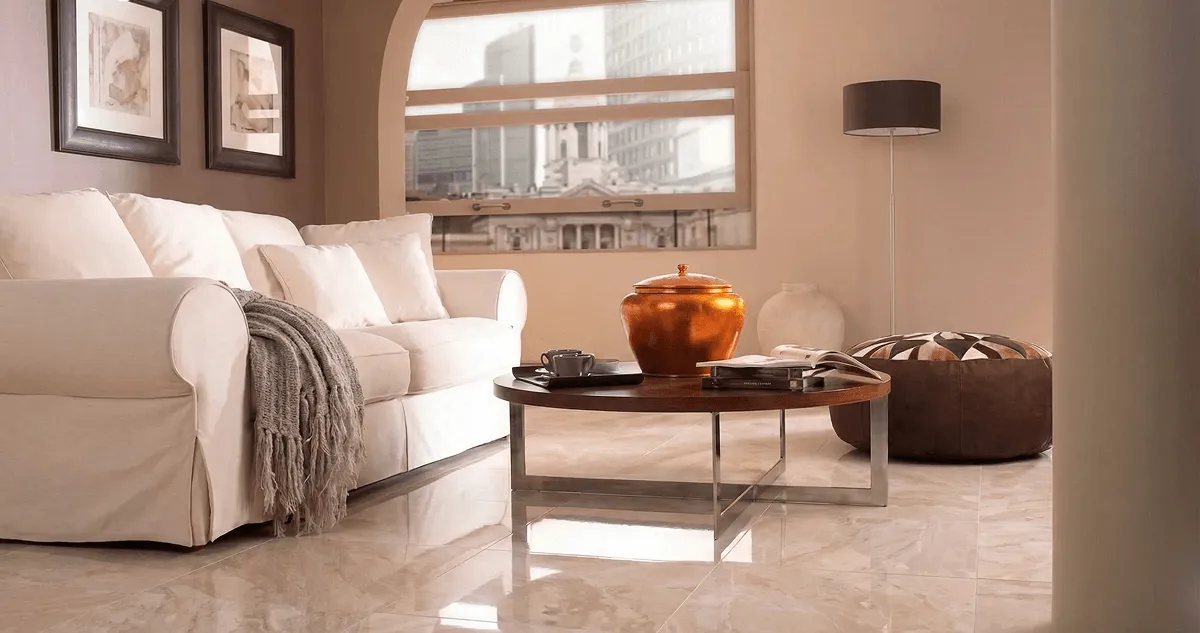 Modern living room with professionally installed marble flooring, a beige sofa, coffee table in San Jose, CA