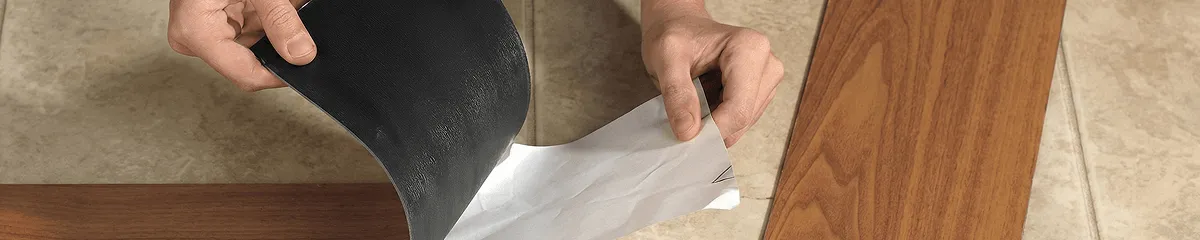 A professional installing vinyl flooring in San Jose, CA